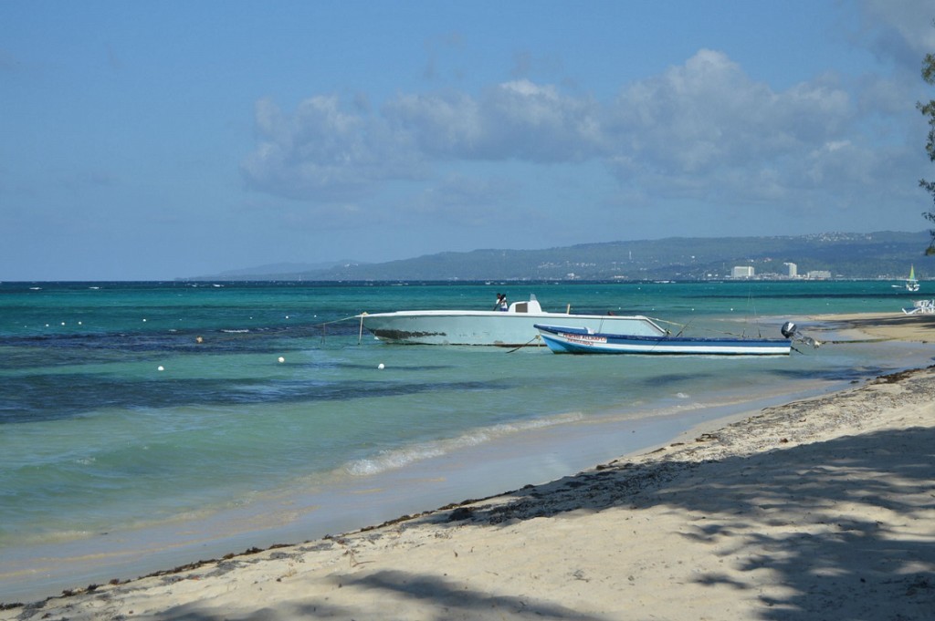 Boats docked on the shore in Ocho Rios, Jamaica