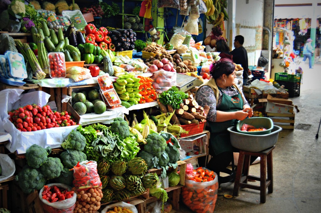 Exploring a local market on a food tour through Lima, Peru