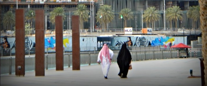 Couple-walking-near-the-Burj-Khalifa