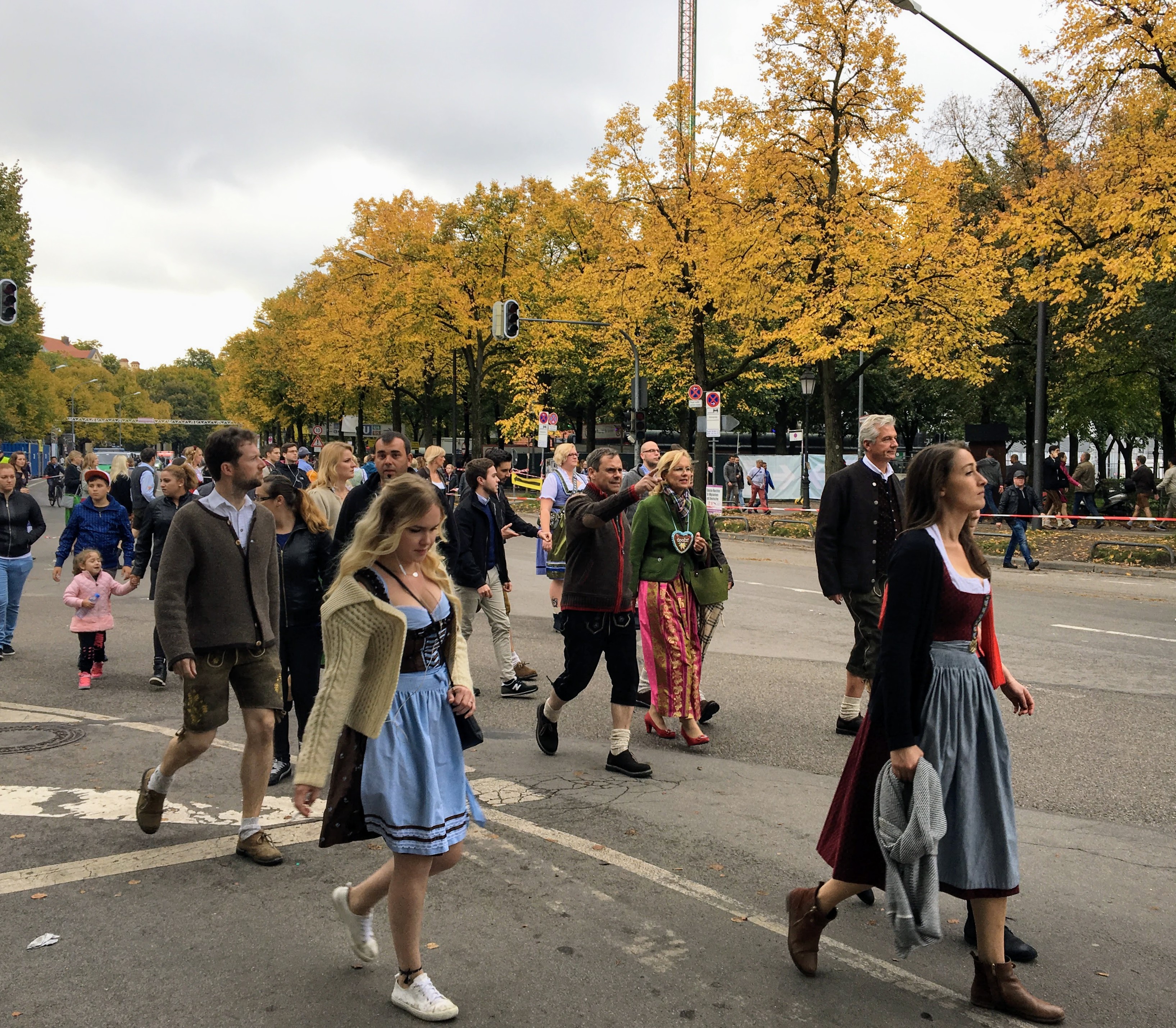 Festival goers walking to Oktoberfest in Munich, Germany