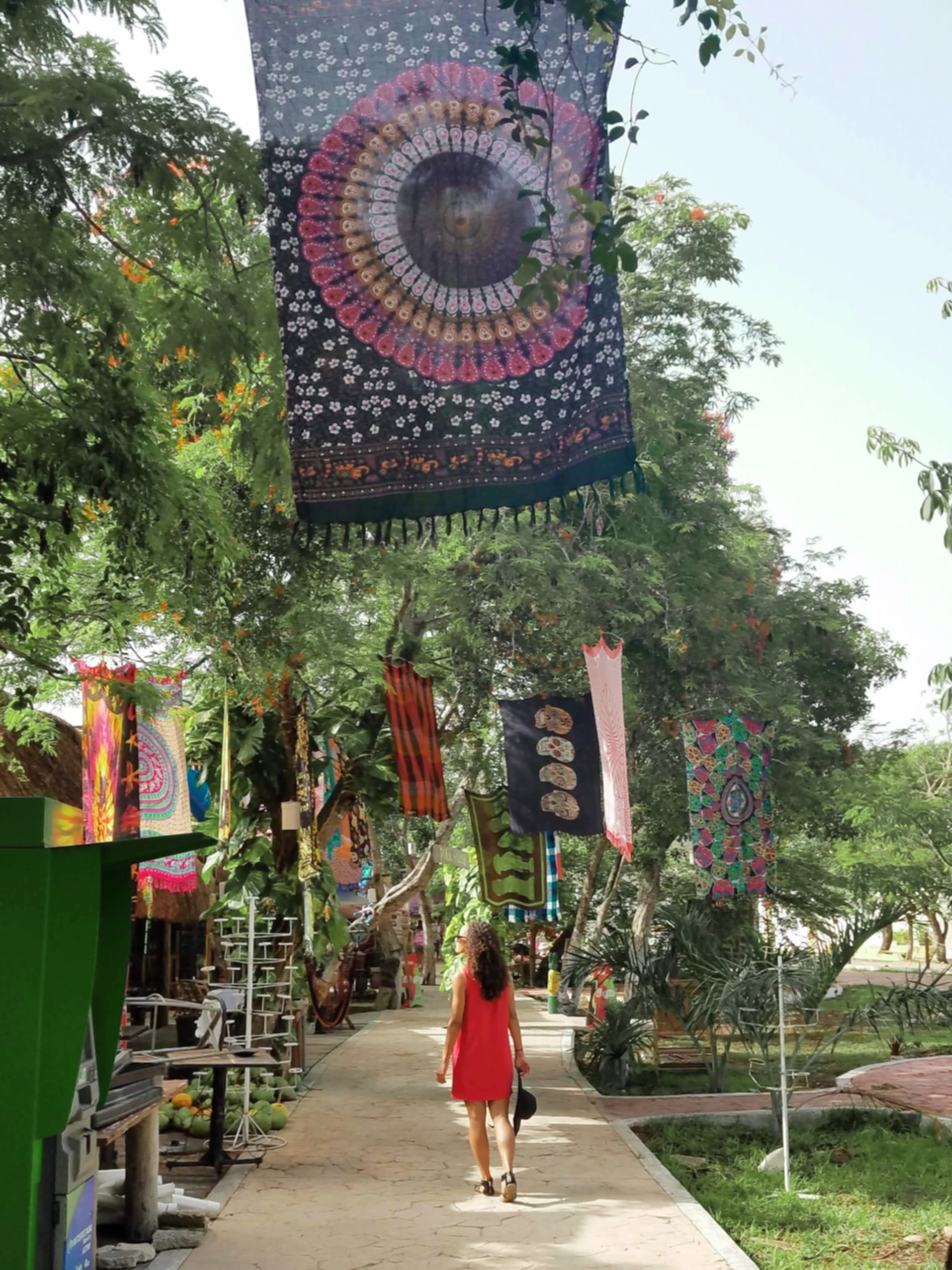 Walking past the colorful markets to the Tulum Ruins