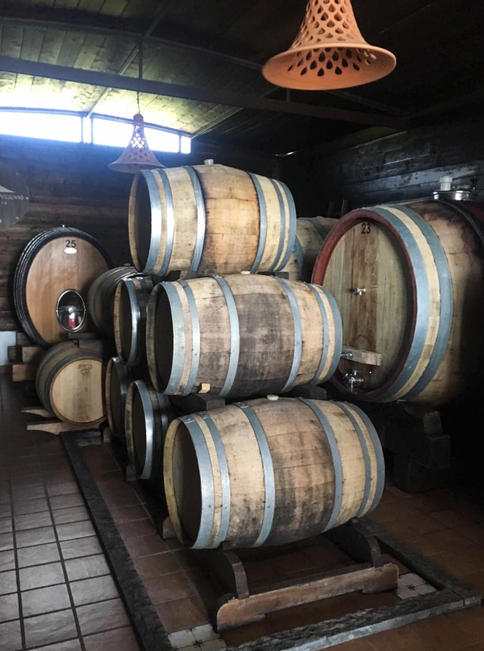 Aging barrels at the Cantina del Vesuvio winery in Italy