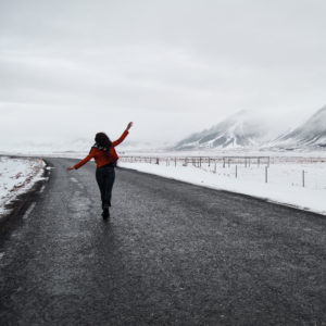 Walking on a deserted road in Iceland