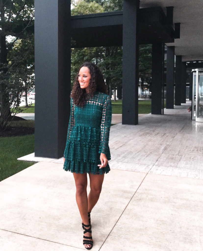 Wearing a green lace Rent the Runway dress in Chicago, Illinois